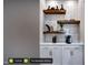Stylish coffee bar with floating shelves and a built-in coffee maker at 127 Preston Trce, Pittsboro, NC 27312