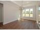 Bright dining room with hardwood floors and large windows at 127 Preston Trce, Pittsboro, NC 27312