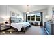 Luxurious main bedroom with hardwood floors and plenty of natural light at 127 Preston Trce, Pittsboro, NC 27312