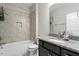 Bathroom boasts a granite vanity and a shower/tub combo at 12408 Angel Vale Pl, Durham, NC 27703