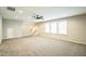 Expansive bonus room with recessed lights, ceiling fan and multiple windows at 12408 Angel Vale Pl, Durham, NC 27703