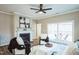 Cozy living room featuring a fireplace, comfortable seating, and sliding doors to outdoor patio at 12408 Angel Vale Pl, Durham, NC 27703