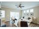 Bright living room featuring modern decor, comfortable seating, and sliding door access to a patio at 12408 Angel Vale Pl, Durham, NC 27703