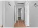 Clean hallway with tile floors and neutral walls at 1306 Hudson Ave, Durham, NC 27705