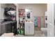 Clean bathroom with a toilet, sink, and washer/dryer at 1508 Carroll Heights Rd, Zebulon, NC 27597
