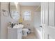 Clean bathroom with a bathtub, toilet, and vanity at 1508 Carroll Heights Rd, Zebulon, NC 27597