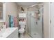 Bathroom with toilet, sink, shower, and linen storage at 1508 Carroll Heights Rd, Zebulon, NC 27597
