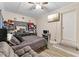 Well-lit bedroom with a queen-size bed and a home office area at 1508 Carroll Heights Rd, Zebulon, NC 27597