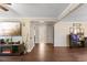 Bright hallway with hardwood floors, leading to bathroom and other rooms at 1508 Carroll Heights Rd, Zebulon, NC 27597