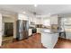 Modern kitchen with granite island and stainless steel appliances at 1508 Carroll Heights Rd, Zebulon, NC 27597