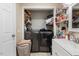 Convenient laundry area with washer, dryer and shelving at 1508 Carroll Heights Rd, Zebulon, NC 27597