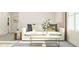 Light and airy living room with a white sofa and coffee table at 1565 Goldfinch Perch Ln, Knightdale, NC 27545