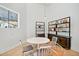 Bright study with white walls, wood floors, and built-in shelves at 1565 Goldfinch Perch Ln, Knightdale, NC 27545