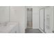 Bathroom with shower, vanity, and en-suite closet at 192 Paper Birch Way, Fuquay Varina, NC 27526