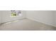 Spacious bedroom with carpeted floor and a window with outside view at 192 Paper Birch Way, Fuquay Varina, NC 27526