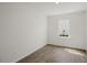 Simple bedroom with large window and hardwood floor at 192 Paper Birch Way, Fuquay Varina, NC 27526