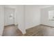 Bright and airy entryway with white door and wood-look flooring at 192 Paper Birch Way, Fuquay Varina, NC 27526