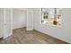 Home office with wood-look floors and french doors at 192 Paper Birch Way, Fuquay Varina, NC 27526