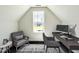 Virtually staged home office with a desk, chair, and window seat at 209 Danube Dr, Zebulon, NC 27597