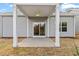 The back patio features a ceiling fan and sliding glass door that welcomes you into the home at 209 Meadowbark Bnd # 20, Garner, NC 27529