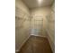 Walk-in closet with carpet and white wire shelving at 209 Meadowbark Bnd # 20, Garner, NC 27529