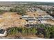 Aerial view of community showing townhomes and surrounding area at 2121 Titanium Rock Rd, Durham, NC 27704