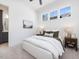 Comfortable bedroom with large windows and plush bedding at 24 Barn Owl Ln, Pittsboro, NC 27312