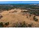 Wide open acreage with a home and outbuildings at 330 Ellis Stewart Ln Ln, Cameron, NC 28326