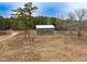 Aerial view of house and expansive property with mature trees at 330 Ellis Stewart Ln Ln, Cameron, NC 28326