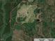 Aerial view showing property lines of a large lot with a home and creek at 330 Ellis Stewart Ln Ln, Cameron, NC 28326