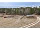 Aerial view of property with pasture and outbuildings at 330 Ellis Stewart Ln Ln, Cameron, NC 28326