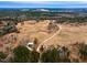 Aerial view of property showing home, outbuildings and roads at 330 Ellis Stewart Ln Ln, Cameron, NC 28326