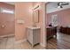 Gray vanity, toilet, and view of bedroom at 330 Ellis Stewart Ln Ln, Cameron, NC 28326