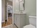 Bathroom with gray vanity and view of dining room at 330 Ellis Stewart Ln Ln, Cameron, NC 28326