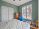 Bedroom with large window and double closet at 330 Ellis Stewart Ln Ln, Cameron, NC 28326