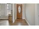 Front entry with wood flooring, door and boxes at 330 Ellis Stewart Ln Ln, Cameron, NC 28326