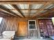 Covered porch with rustic wood siding and shipping container at 330 Ellis Stewart Ln Ln, Cameron, NC 28326
