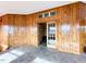 Interior with wood walls, tile floor, and French doors at 330 Ellis Stewart Ln Ln, Cameron, NC 28326