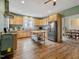 Well-equipped kitchen featuring an island, wood cabinets and stainless steel appliances at 330 Ellis Stewart Ln Ln, Cameron, NC 28326