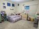 bedroom featuring a trundle bed and colorful decor, offering a playful and inviting space at 359 Ballast Pt, Clayton, NC 27520