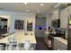 Modern kitchen boasts a large island, open layout, and stainless steel appliances at 359 Ballast Pt, Clayton, NC 27520