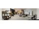 Spacious living room featuring white boards, shelving, and a desk area, perfect for a home office or creative space at 359 Ballast Pt, Clayton, NC 27520