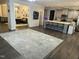 Spacious living room with an island, barstools, and open floor concept at 359 Ballast Pt, Clayton, NC 27520
