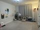 Spacious playroom with ample floor space, creative wall decorations, and functional storage, ideal for activities at 359 Ballast Pt, Clayton, NC 27520