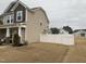 Well-maintained side yard with privacy fence showcasing the property's neat landscaping and curb appeal at 359 Ballast Pt, Clayton, NC 27520