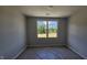Bedroom with natural light from a large window, perfect for relaxation and comfort at 3854 Well Fleet Drive, Fuquay Varina, NC 27526