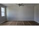 Spacious bedroom with neutral walls and ample natural light, ready for your personal touch at 3854 Well Fleet Drive, Fuquay Varina, NC 27526