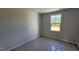 Bedroom with a bright window providing natural light, complemented by neutral paint at 3854 Well Fleet Drive, Fuquay Varina, NC 27526