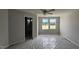 Bedroom with natural light from two windows and an adjoining bathroom for added convenience at 3854 Well Fleet Drive, Fuquay Varina, NC 27526