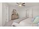Comfortable bedroom with plush carpet, neutral decor, and ample closet space for storage solutions at 3854 Well Fleet Drive, Fuquay Varina, NC 27526